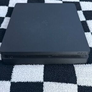 Sony PS4 Console - Black
Comes with a Orange and Navy blue controller.